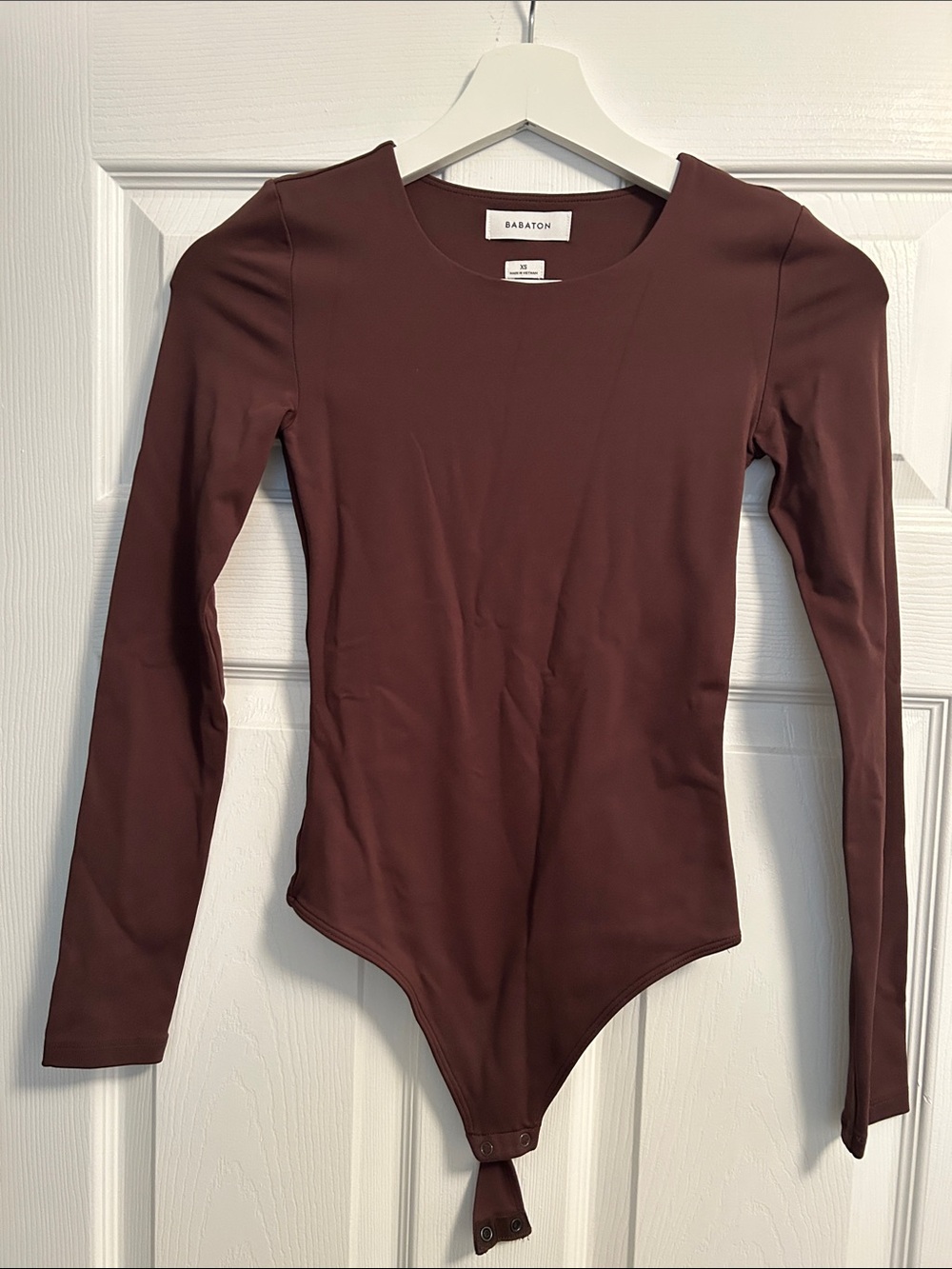 Babaton Long Sleeve One-Piece Bodysuit in Maroon